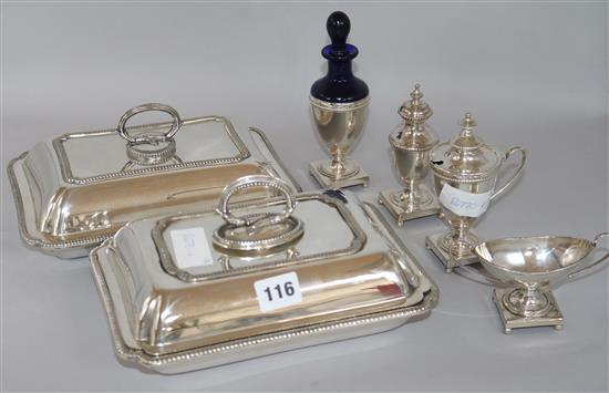 Two plated entree dishes and a condiment set